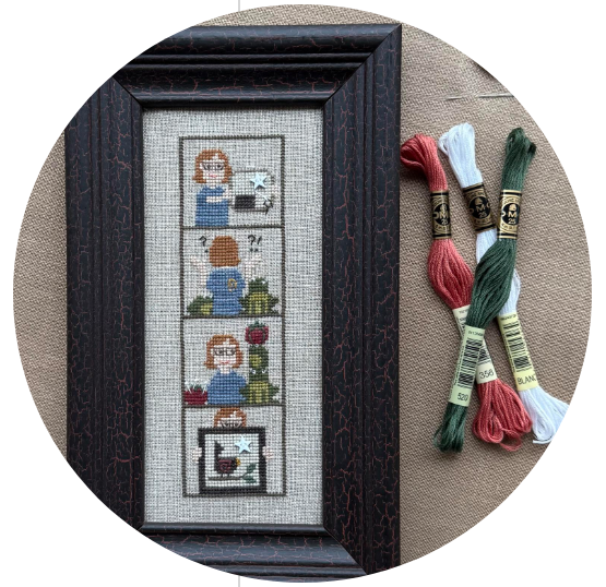 Framed cross-stitch artwork with text about 'A Stitcher's Life' photobooth on a white background.