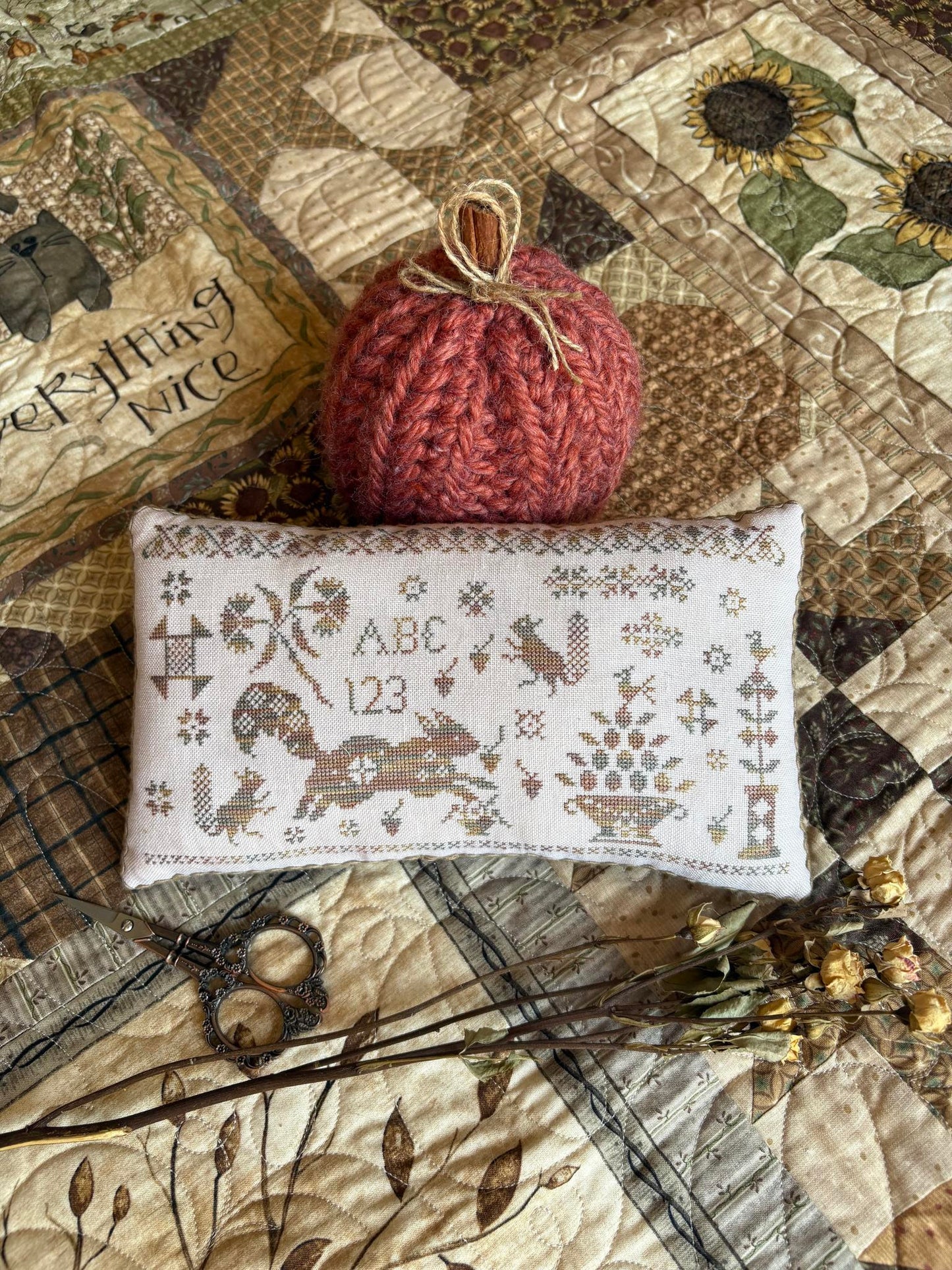 PREORDER Sassy Squirrel Pinkeep - Pansy Patch - Cross Stitch Pattern